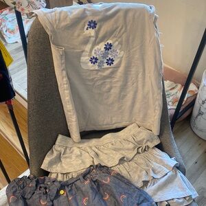 10/12 bundle. Two cute skirts and size 10 swan tshirt
